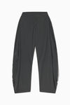 Flat lay front view of the oversized, horseshoe-style jet nylon Barrel Pant with side pockets, zip fly, pleated sides and adjustable snap closures at the ankle.