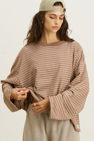 Front view of model posing in the relaxed fit, lightweight canyon stripe classic cotton Boxy Crew Long Sleeve top with a crew neckline, dropped shoulders and oversized silhouette