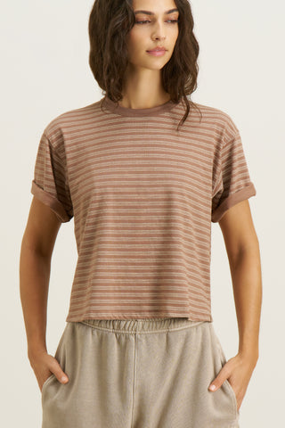 Front view of model posing in the relaxed fit, lightweight canyon stripe classic cotton Boxy Tee with a crew neckline and short sleeves