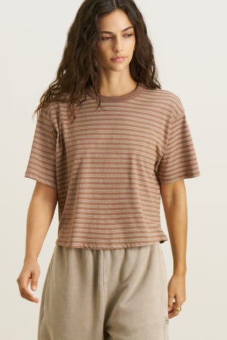 Front view of model posing in the relaxed fit, lightweight canyon stripe classic cotton Boxy Tee with a crew neckline and short sleeves