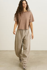Full body front view of model posing in the relaxed fit, lightweight canyon stripe classic cotton Boxy Tee with a crew neckline and short sleeves