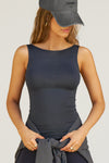 Front view of model posing in the fitted, lightweight black modal Boatneck Tank top with a boat neckline