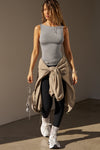 Full body front view of model posing in the fitted, lightweight shadow modal Boatneck Tank top with a boat neckline