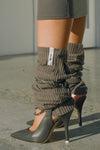 Close up side view of the slouchy, pull on army luxe knit Leg Warmers that can be worn pulled up on scrunched down