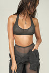 Front view of model posing in the sheer graphite mesh Scoop Neck Racerback Bra with a scoop neckline
