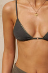 Close up detail front view of model posing the sheer, minimal coverage graphite mesh Triangle Bralette with thin and glossy adjustable elastic straps