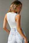 Back view of model posing in the form fitting pearl grey flexrib Invisible Zip Tank top with a front invisible zipper and a crew neckline