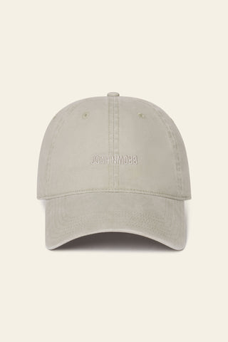 Flat lay front view of the six-panel sahara Official Cap with a curved brim and an embroidered upside down Joah Brown logo on the front