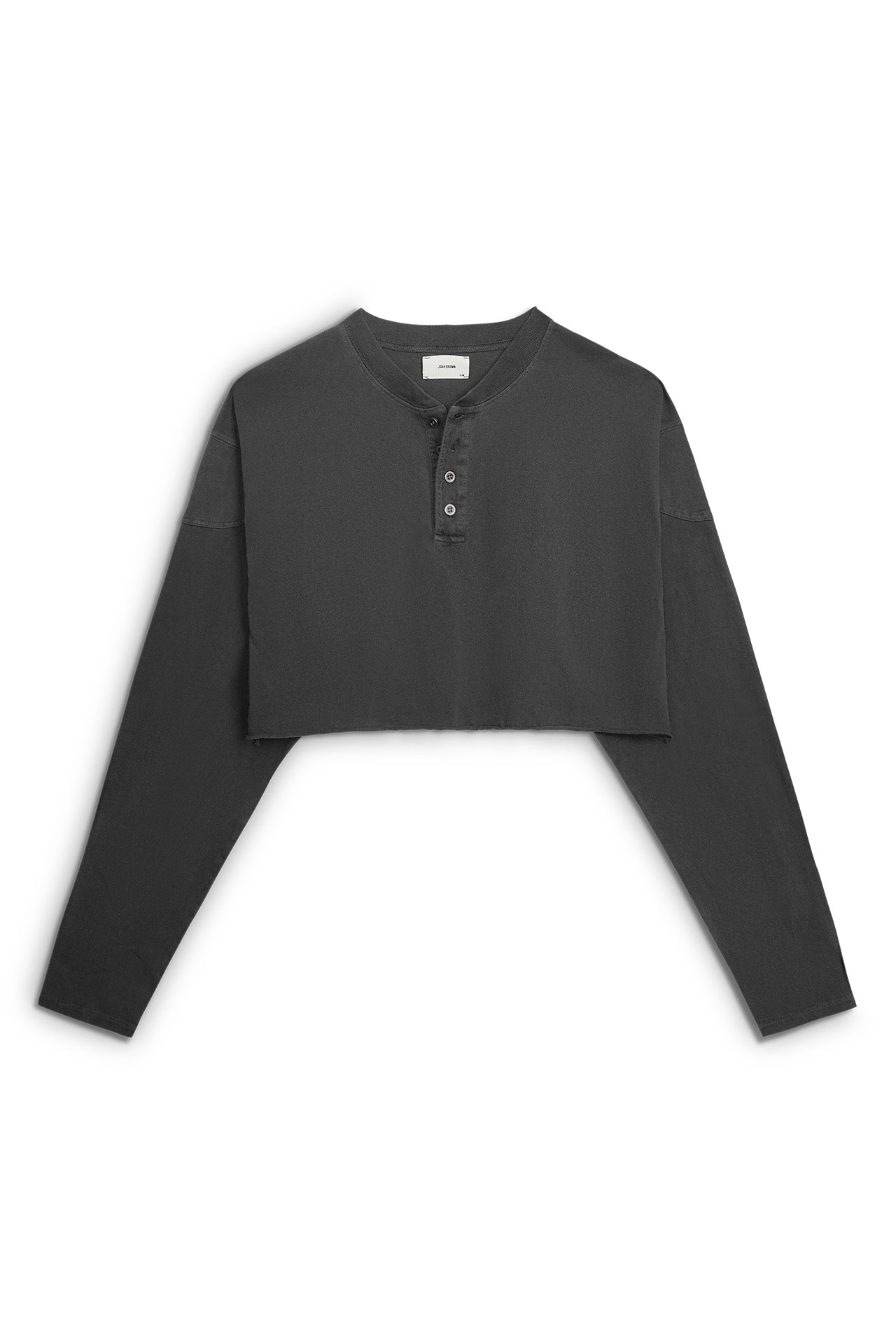 Flatlay image of the cropped, loose-fitting washed black cotton Vintage Henley Long Sleeve top with dropped shoulders and custom JOAH BROWN buttons