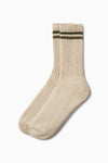 Flat lay view of the oat and olive crew Hiker Sock with ribbed detailing & two thin stripes.