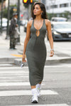 Full body front view of model posing in the sleeveless mineral flexrib Plunge Tie Midi Dress with a plunging neckline and tie detail at the bust