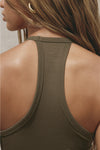 Close up detail back view of model posing in the fitted woodland flexrib Plunge Racerback Tank top with a racerback silhouette.