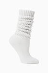 Flat lay side view of the slouchy classic white Scrunch Sock with extra long ribbed cuffs