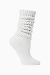 Flat lay side view of the slouchy classic white Scrunch Sock with extra long ribbed cuffs