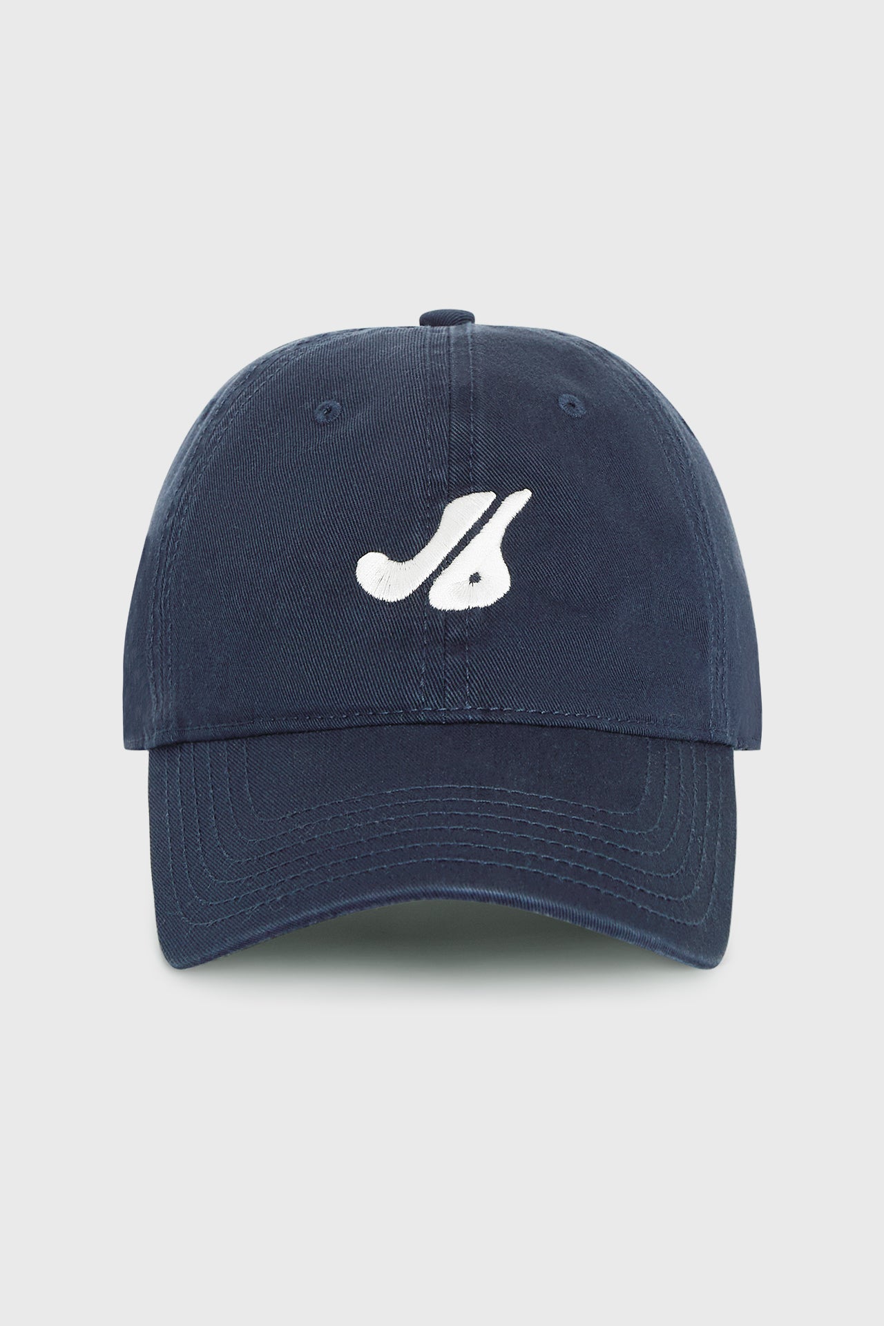 Flat lay front view of the structured six-panel navy The Classic Cap with a curved brim, adjustable back strap and an embroidered front and back Joah Brown logo