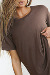 Close up front view of model posing in the relaxed fit tobacco modal My Boys Tee with a crew neckline